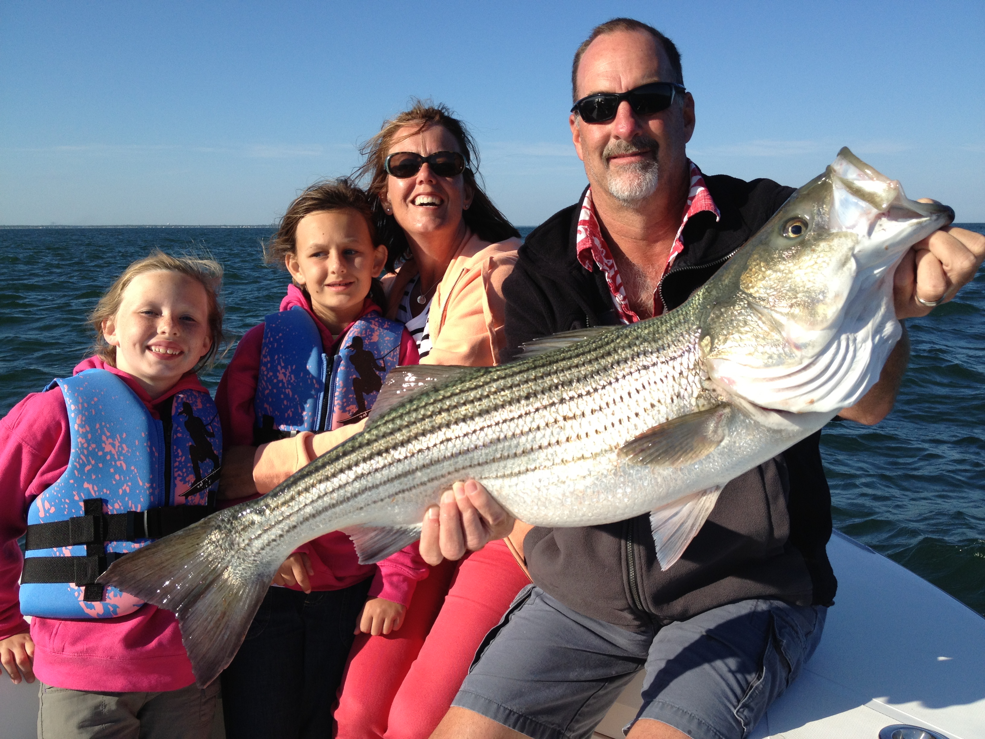 Cape Cod family fishing out of Falmouth Mass Fantastic with stripers every trip